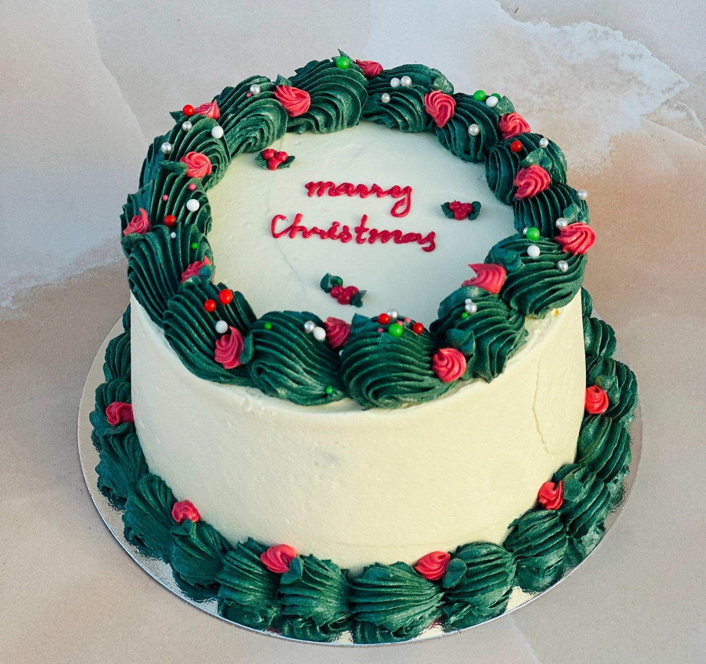 Same-day Christmas cake delivery in Stratford and Walthamstow – handmade holiday cake with festive design.