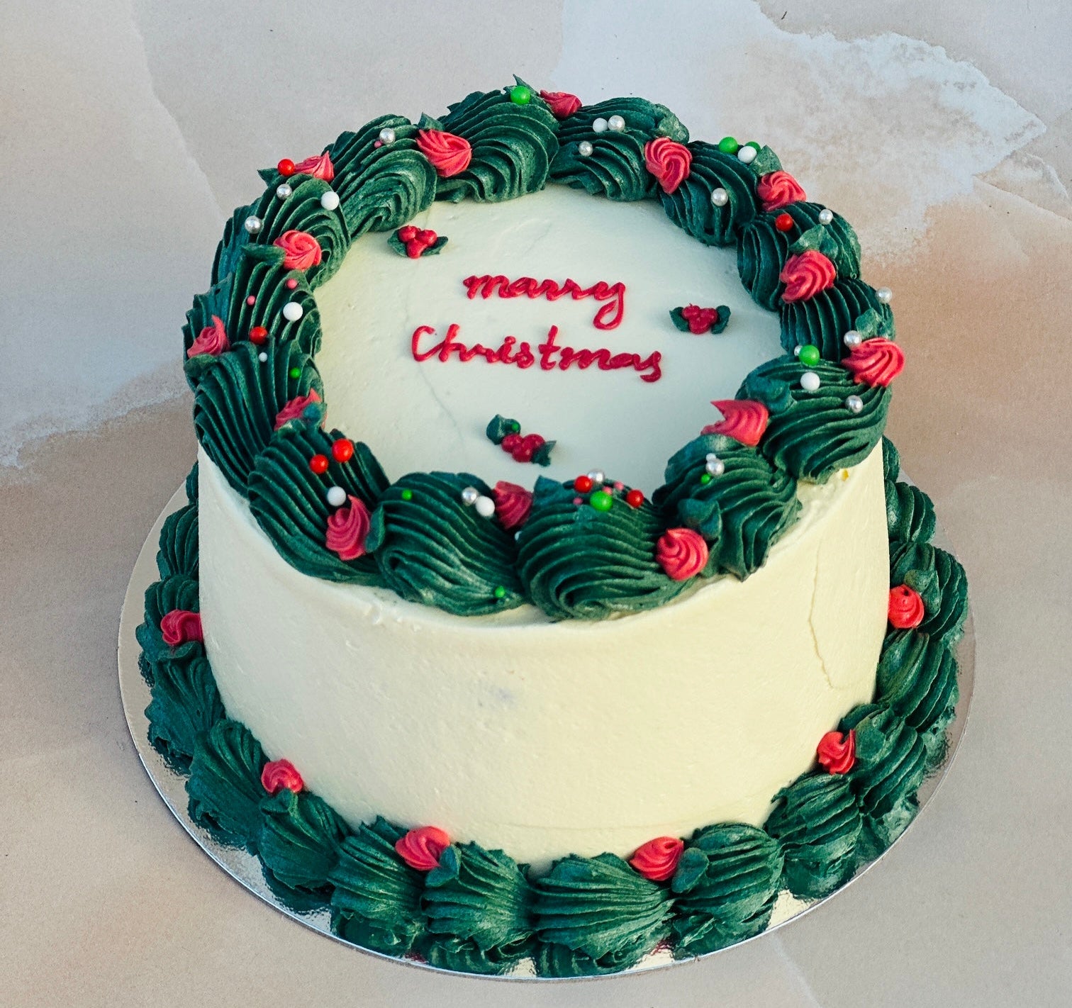 Same-day Christmas cake delivery in Stratford and Walthamstow – handmade holiday cake with festive design.