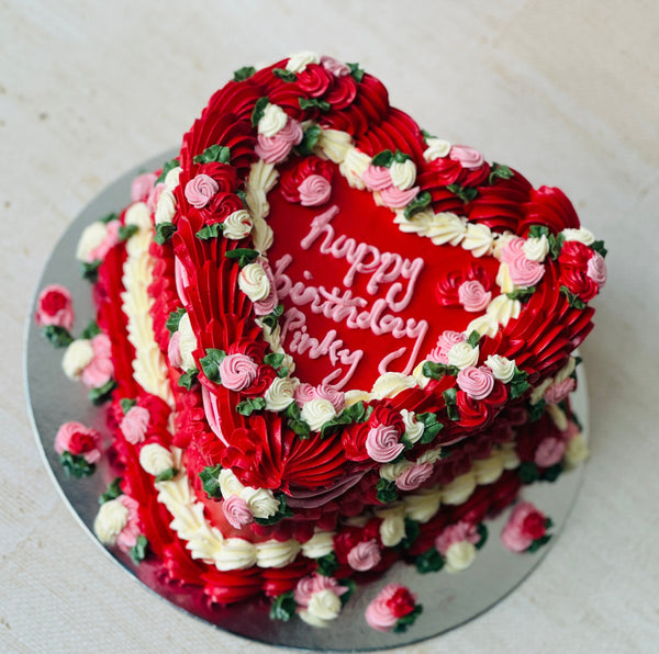 Red heart cake delivery in Stratford and Walthamstow, romantic buttercream heart cake for birthdays.