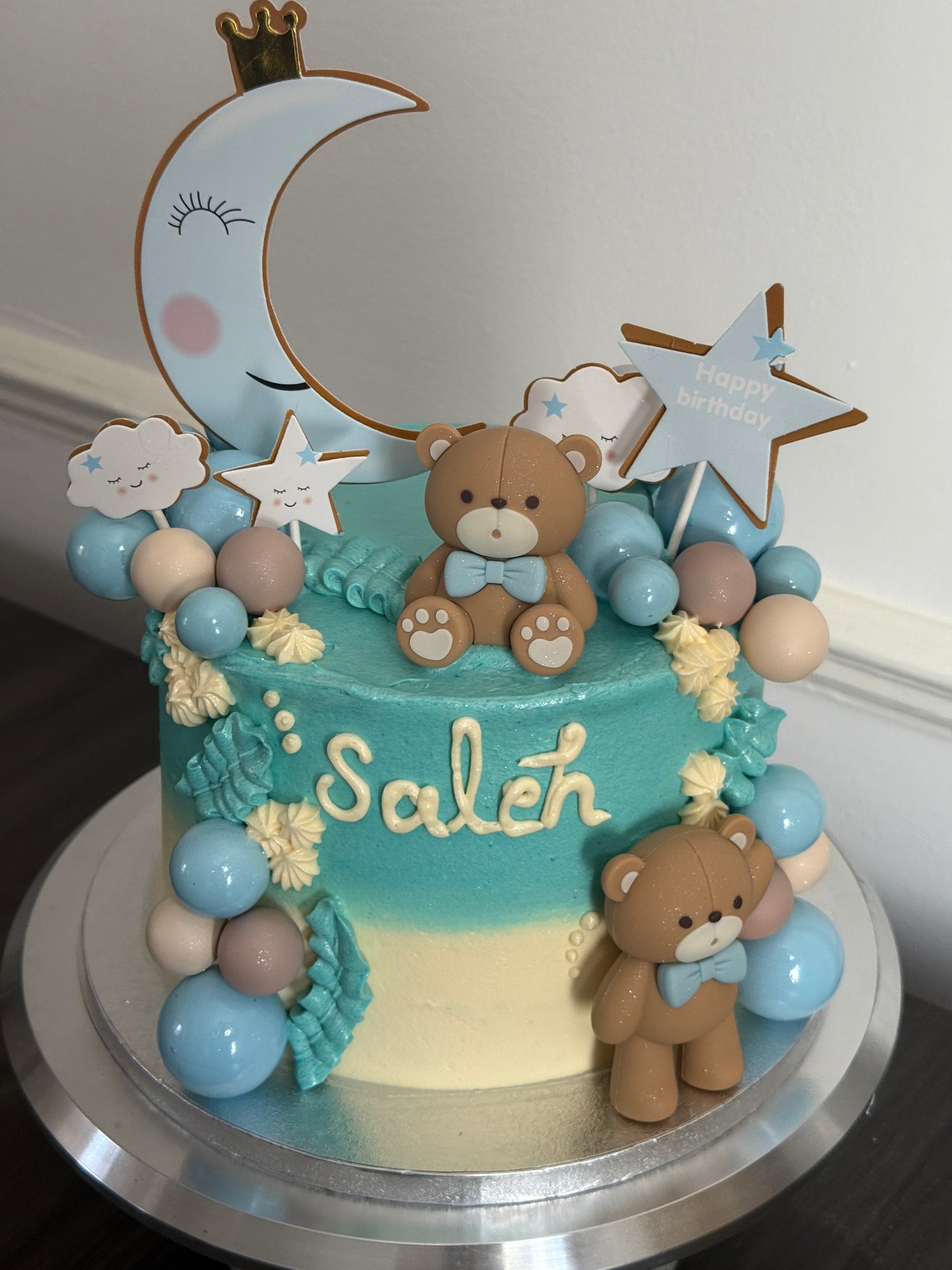 Customisable Teddy Bear Baby Celebration Cake with moon topper for first birthdays in Dagenham, Barking, and Stratford