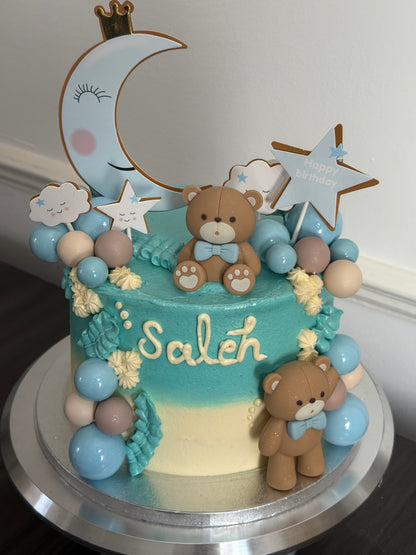 Customisable Teddy Bear Baby Celebration Cake with moon topper for first birthdays in Dagenham, Barking, and Stratford