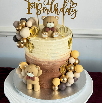 Side view of teddy bear first birthday cake, custom cakes East London, Romford and Ilford.