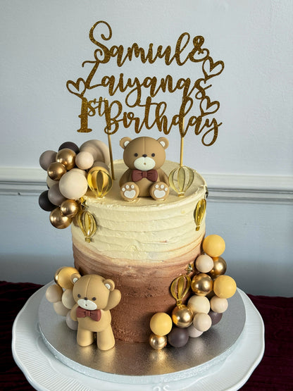 Teddy bear first birthday cake with ombre buttercream and balloon detailing, custom cakes East London, Romford and Ilford.