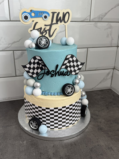Angled view of the two-tier race car birthday cake, custom cakes East London, Romford and Ilford.
