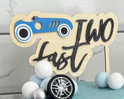 Close up of the Two Fast race car topper and tyres, custom cakes East London, Romford and Ilford.