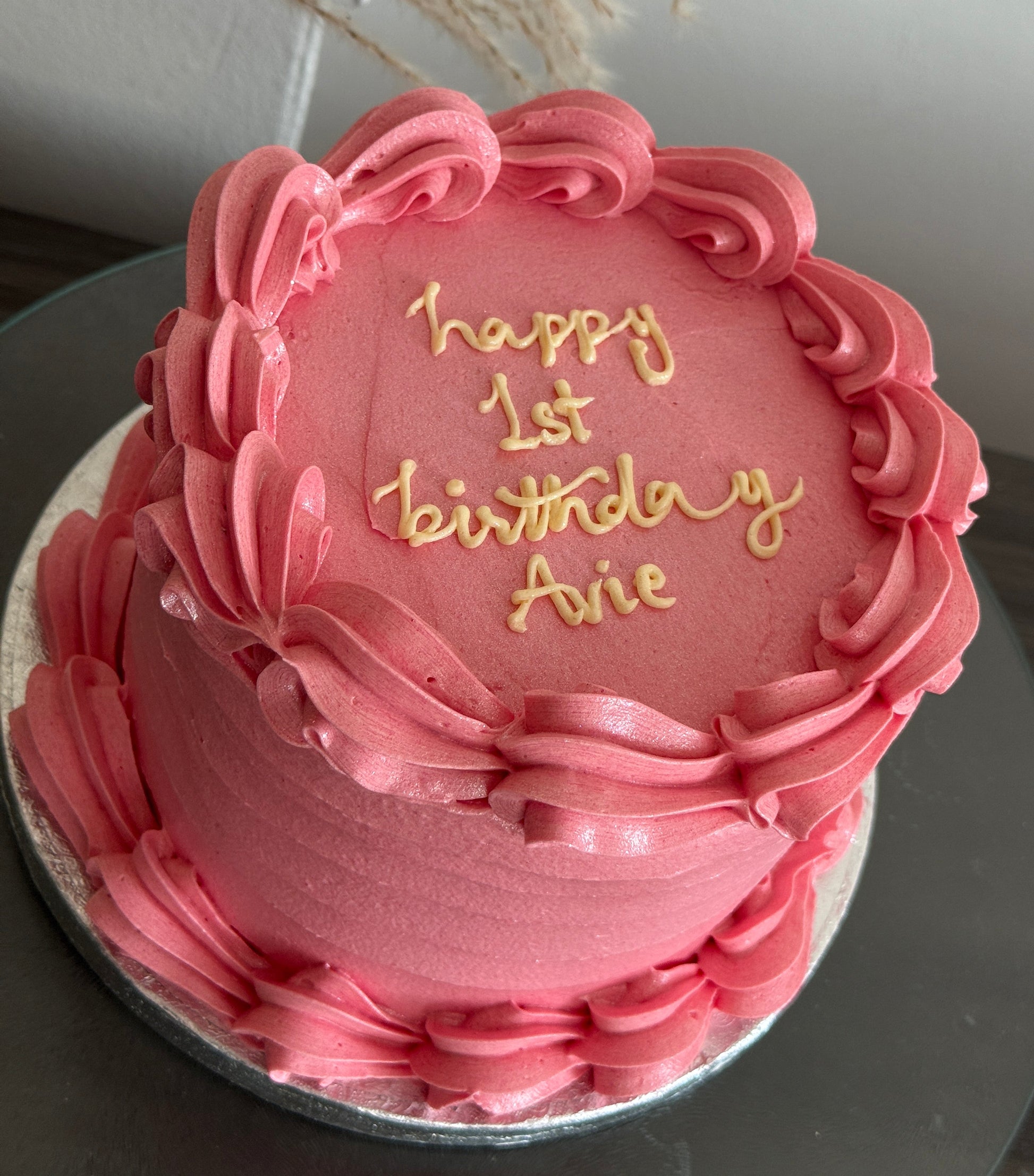 Custom birthday cake with personalised writing and buttercream design, available for delivery in Ilford and Chigwell.