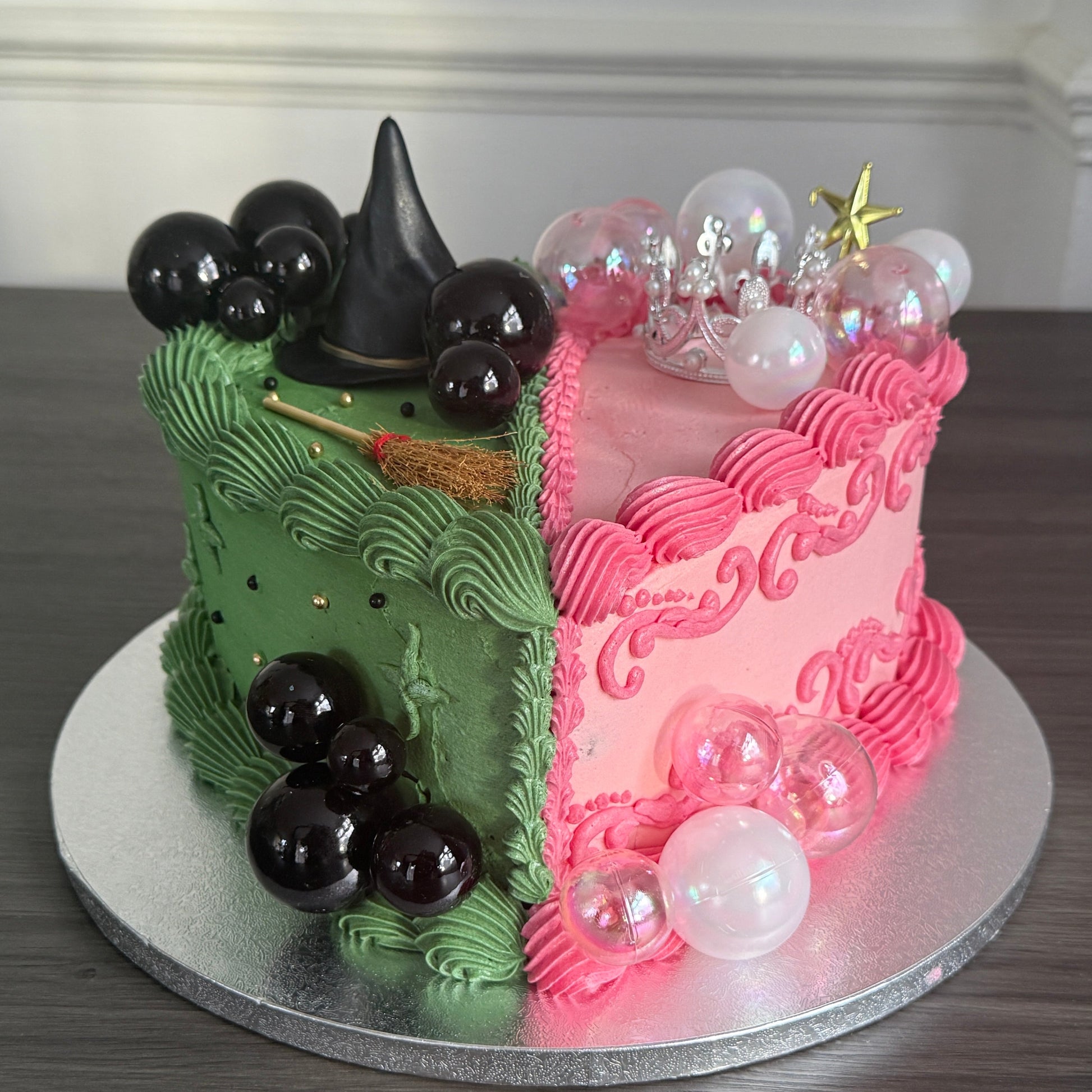 Custom Wicked half-and-half celebration cake with heart shape design delivered across Ilford, Romford and East London