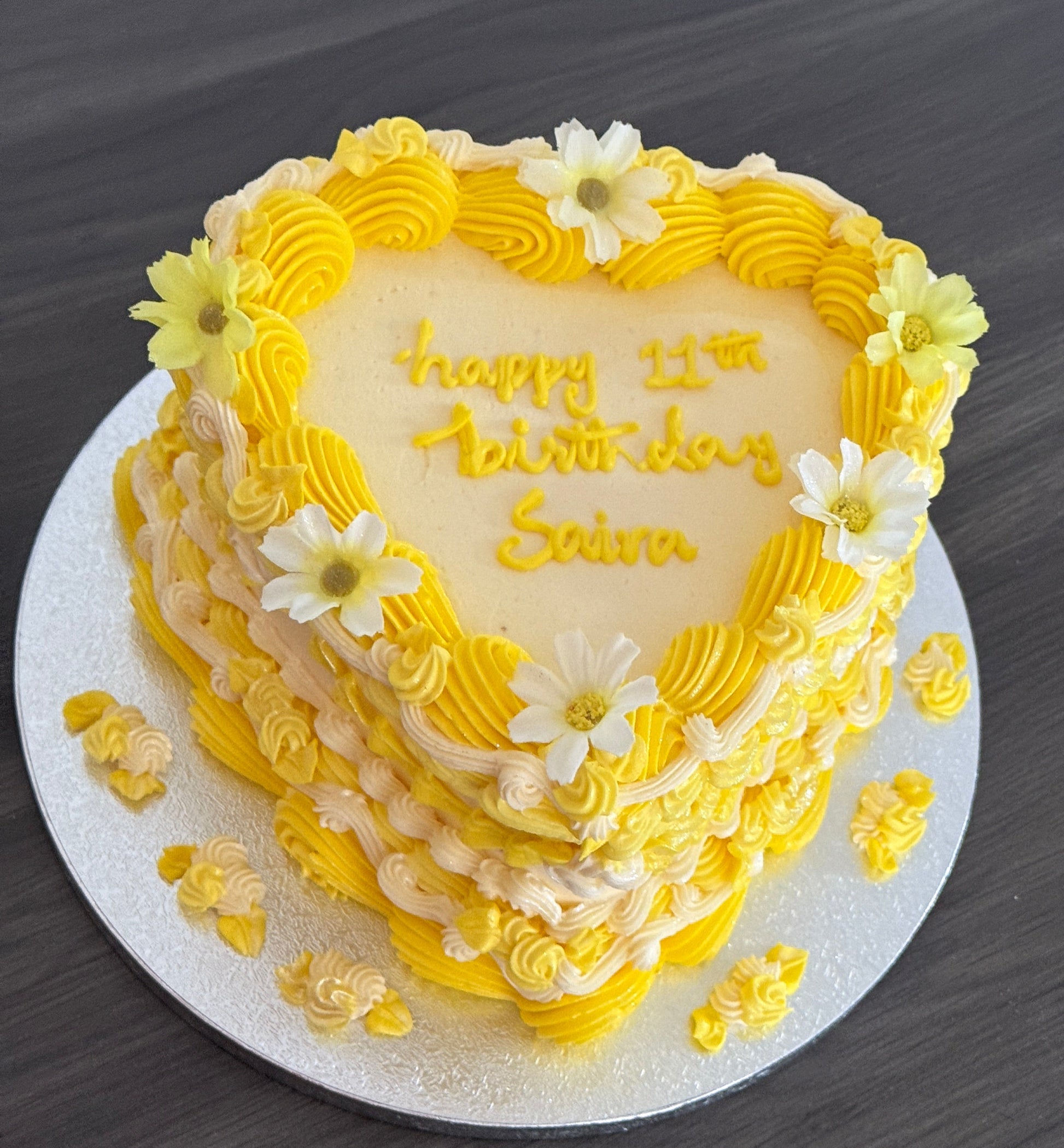 Yellow heart cake with personalised message option, cake delivery to East Ham and Stratford.