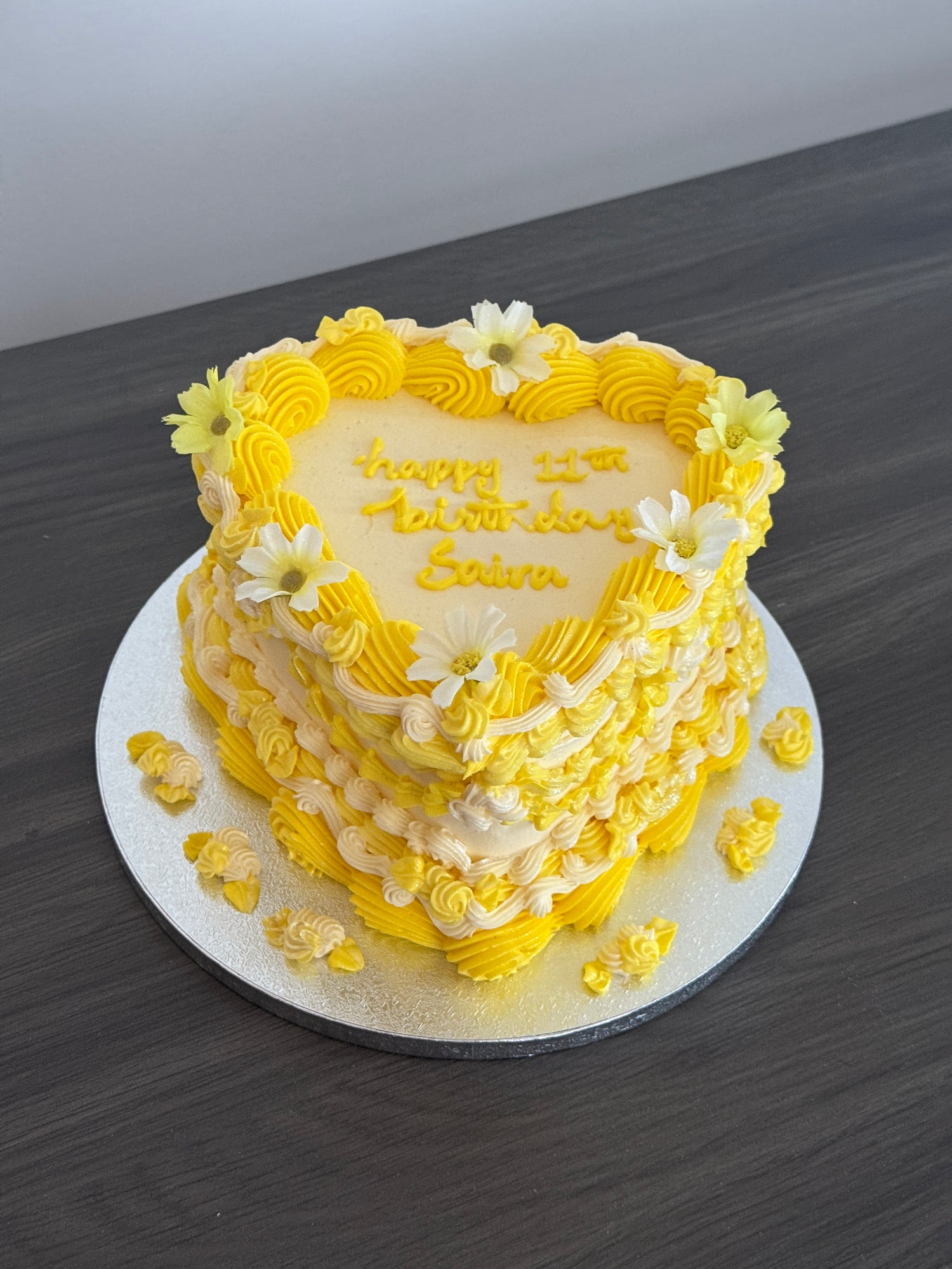 Yellow Floral Vintage Heart Cake with buttercream piping, same day cake delivery in Romford and Ilford, East London.