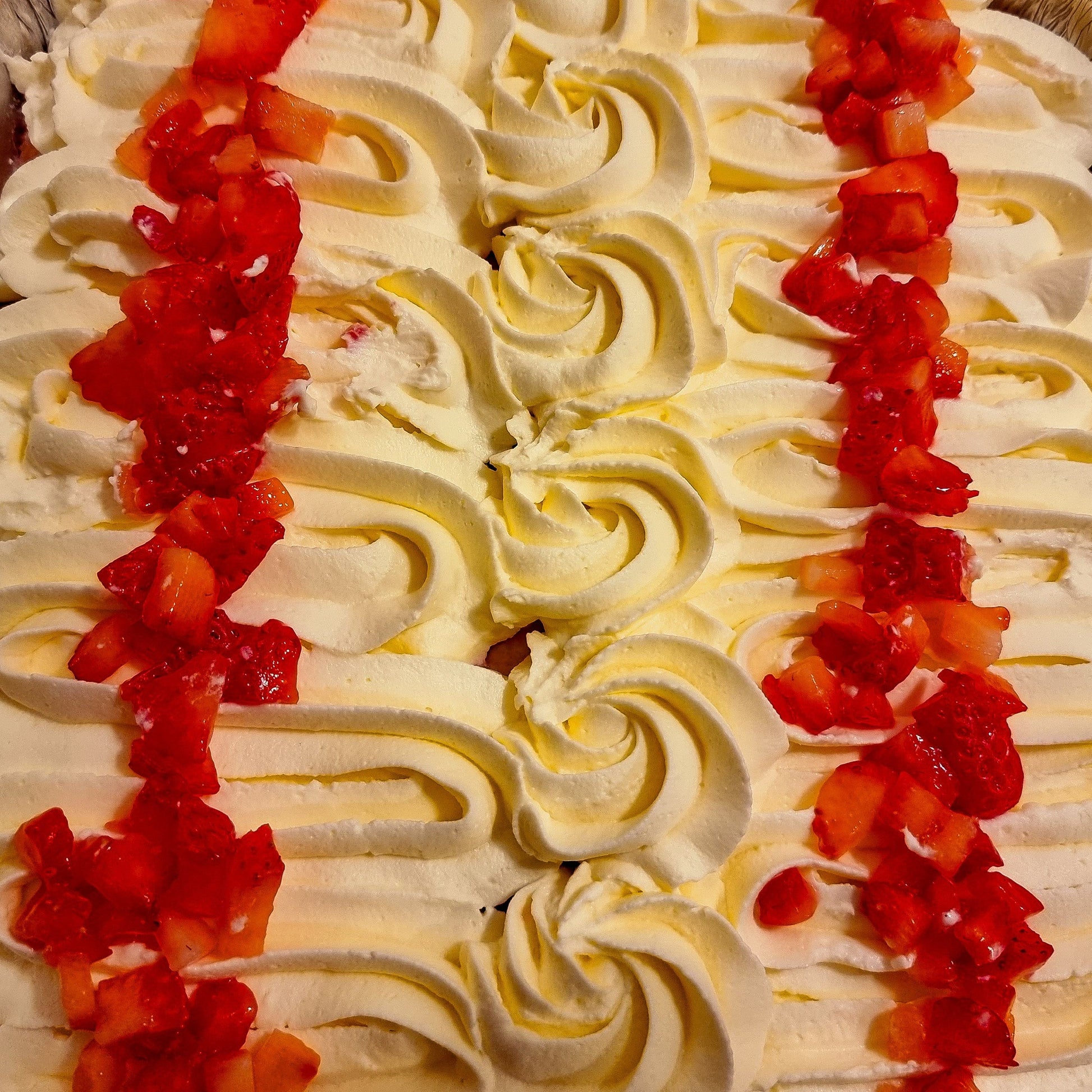 Scrumptious strawberry milk cake tray adorned with fresh strawberry slices