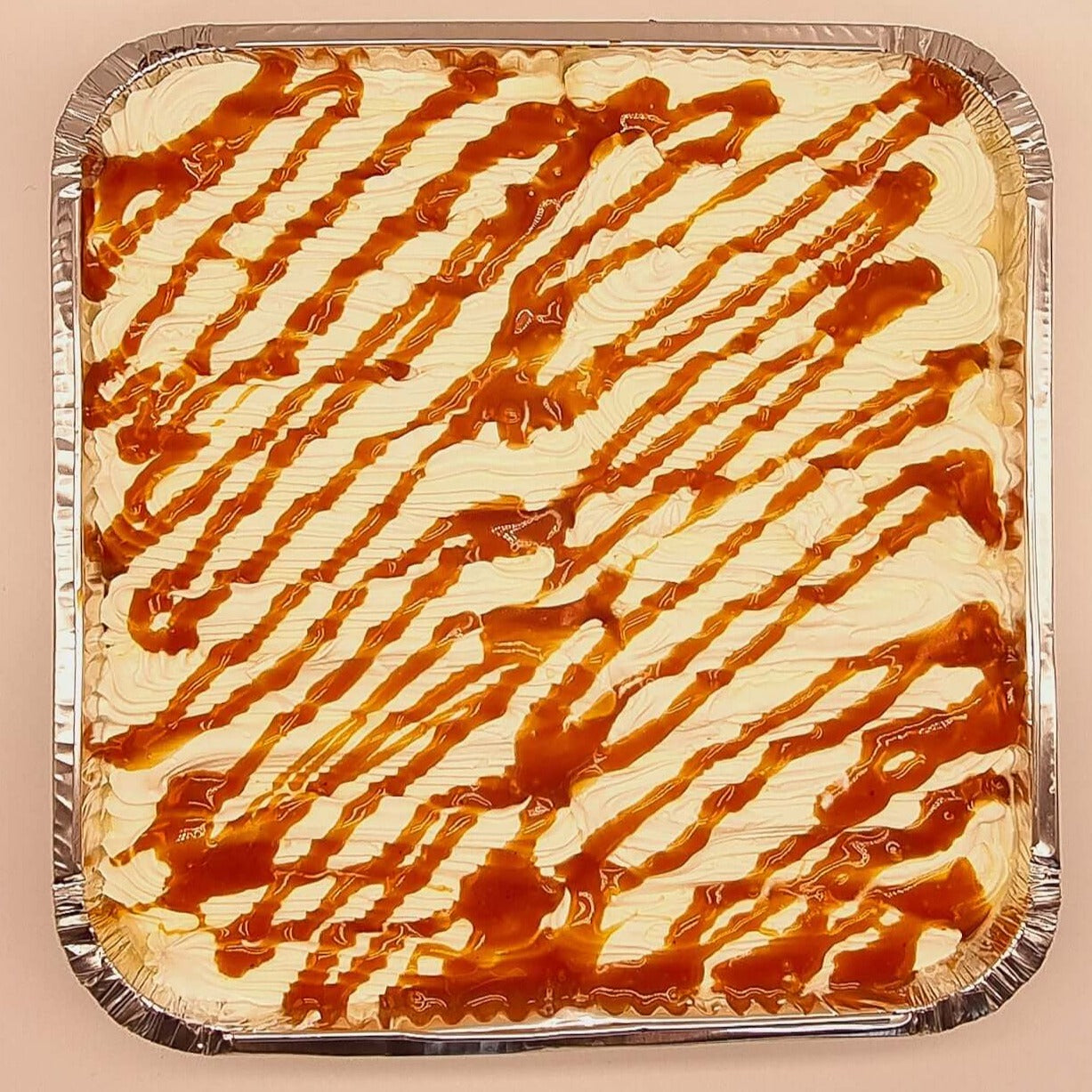 Delectable caramel milk cake tray with a luscious caramel drizzle