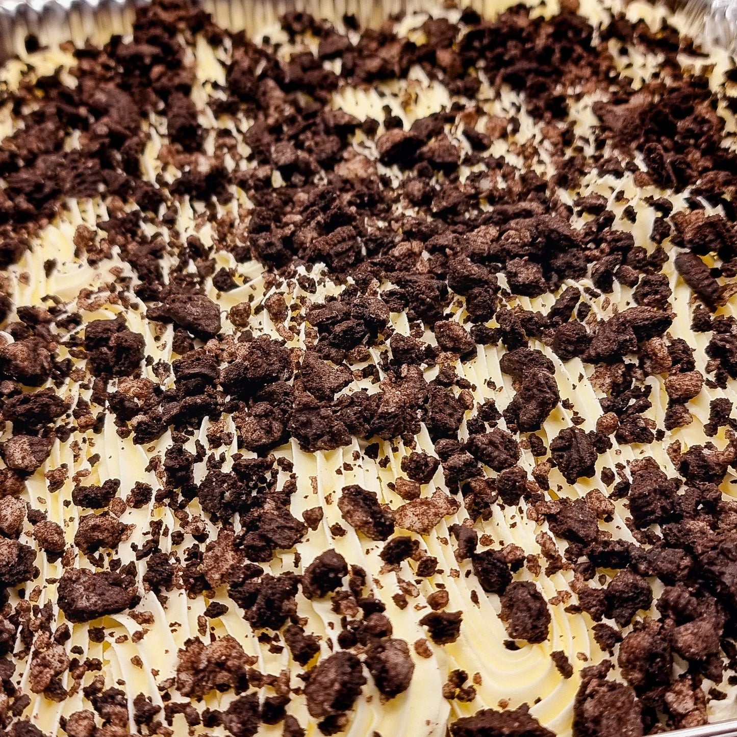 Oreo Milk Cake Tray topped with crushed Oreo biscuits – creamy dessert available for same-day delivery in Romford, Ilford, and East London.