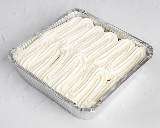 Vanilla Milk Cake Tray with whipped cream topping in aluminium tray – same-day cake delivery in Romford and Ilford, East London.