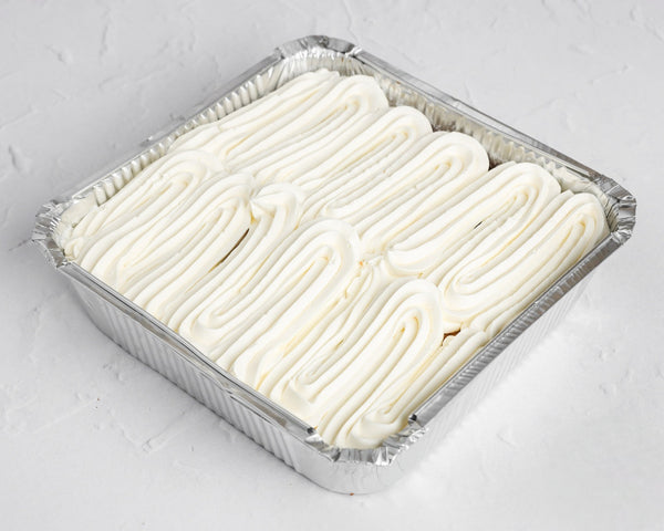 Vanilla Milk Cake Tray with whipped cream topping in aluminium tray, delivery in Romford and Ilford, East London.